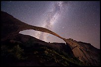 Landscape Arch bissected by Milky Way. Arches National Park, Utah, USA.