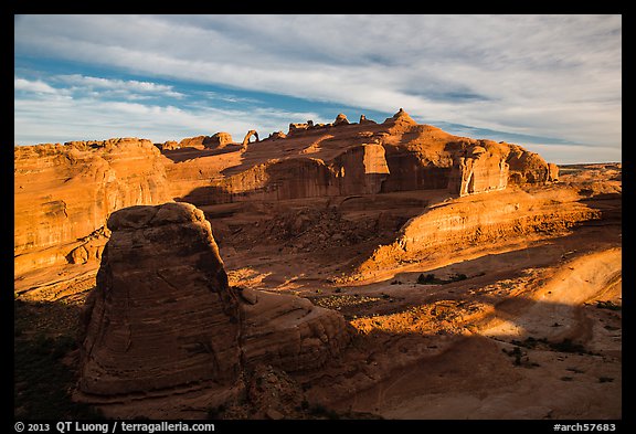 Winter Camp Wash and Delicate Arch at sunrise. Arches National Park, Utah, USA.