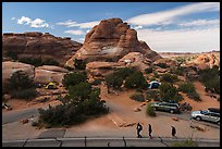 People walking in Devils Garden  Campground. Arches National Park, Utah, USA. (color)