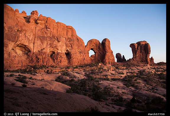 Cove of Arches, Double Arch, and Parade of Elephants at dusk. Arches National Park, Utah, USA.