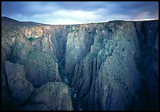 Narrow gorge under dark clouds. Black Canyon of the Gunnison National Park ( color)