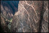 Wall with swirling veins of igneous pegmatite. Black Canyon of the Gunnison National Park, Colorado, USA.