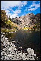 Gunnison River shore and cliffs at East Portal in the fall. Black Canyon of the Gunnison National Park ( color)