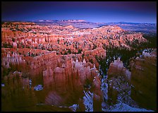 View of Bryce Amphitheater hoodoos from Sunset Point at dusk. Bryce Canyon National Park, Utah, USA.