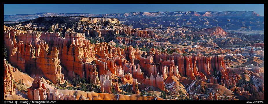 Densely aligned pinnacles in horseshoe-shaped amphitheaters along edge of Pausaugunt Plateau. Bryce Canyon National Park (color)