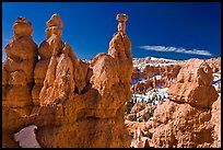 Capped hoodoos and amphitheatre. Bryce Canyon National Park, Utah, USA. (color)