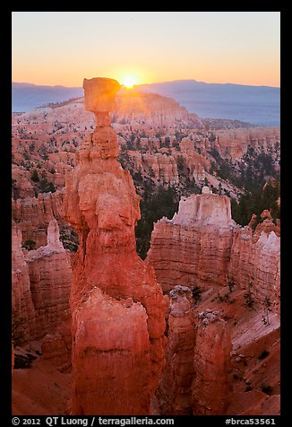 Sun rising behind Thor Hammer. Bryce Canyon National Park, Utah, USA.