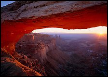 Sunrise through Mesa Arch, Island in the Sky. Canyonlands National Park, Utah, USA.