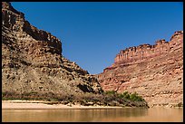 Cliffs towering above Confluence of Green and Colorado Rivers. Canyonlands National Park ( color)