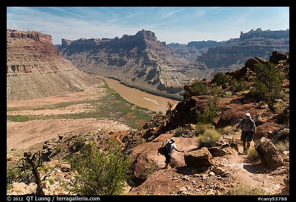 Hikers on steep trail to Dollhouse from Spanish Bottom. Canyonlands National Park, Utah, USA.