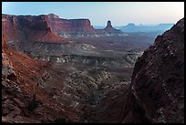 Cliffs and Candlestick Butte at dusk. Canyonlands National Park, Utah, USA.