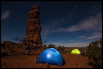 Tents at night below Standing Rock. Canyonlands National Park, Utah, USA. (color)