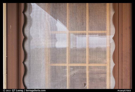 Distant canyons, Hans Flat ranger station window reflexion. Canyonlands National Park (color)