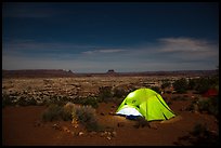 Tent overlooking the Maze at night. Canyonlands National Park, Utah, USA. (color)