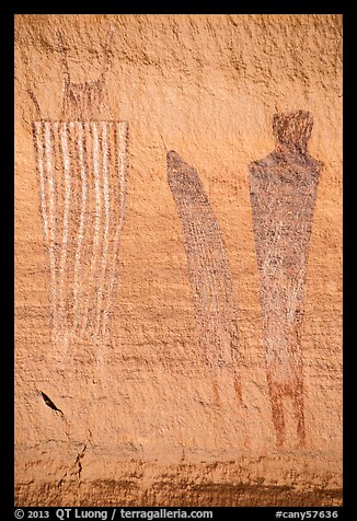 Bowing to large anthropomorphic figure with white stripes, Harvest Scene. Canyonlands National Park (color)