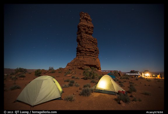 Camp at the base of Standing Rock at night. Canyonlands National Park, Utah, USA.