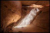 Chamber and sunray, the Dollhouse, Maze District. Canyonlands National Park, Utah, USA.