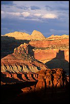 Cliffs and domes in the Waterpocket Fold, clearing storm, sunset. Capitol Reef National Park, Utah, USA. (color)