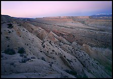 Strike Valley and Waterpocket Fold at dusk. Capitol Reef National Park, Utah, USA. (color)