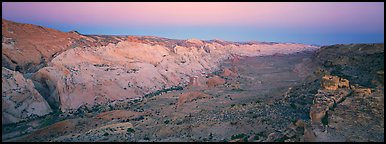 Waterpocket fold in pastel hues at dawn. Capitol Reef National Park (Panoramic color)