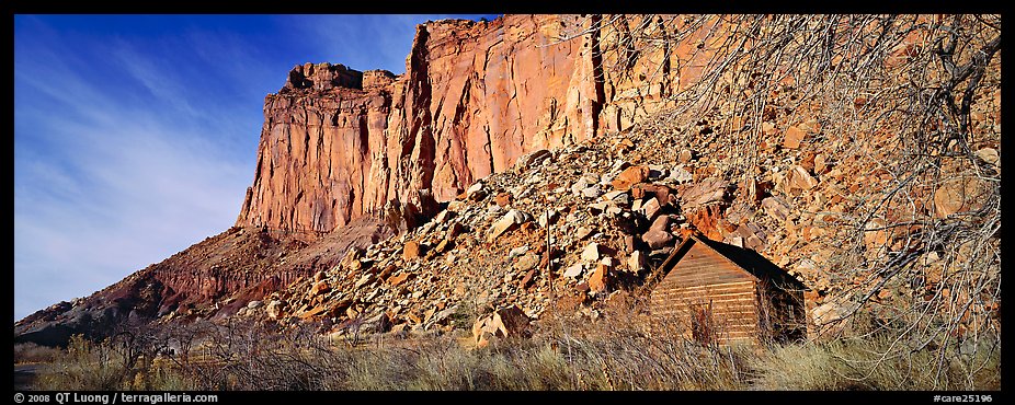 Fruita pioneer school house at the base of sandstone cliffs. Capitol Reef National Park, Utah, USA.