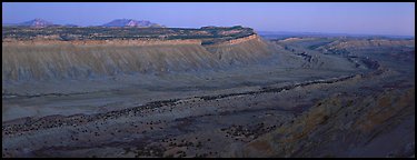 Long chain of cliffs of the Waterpocket Fold at dusk. Capitol Reef National Park, Utah, USA.