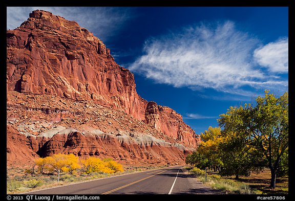 Rood, cliffs, and orchard in autumn. Capitol Reef National Park, Utah, USA.