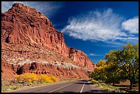 Rood, cliffs, and orchard in autumn. Capitol Reef National Park, Utah, USA.