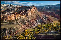 Waterpocket Fold cliffs and orchards from Rim Overlook in the fall. Capitol Reef National Park, Utah, USA.