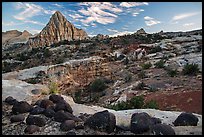 Black volcanic boulders and Pectol Pyramid. Capitol Reef National Park, Utah, USA. (color)