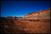 Fluted cliffs of Waterpocket Fold at night. Capitol Reef National Park, Utah, USA.