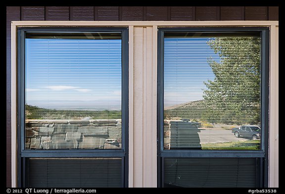 Parking lot and Basin open view, Lehman Caves visitor Center window reflexion. Great Basin National Park (color)