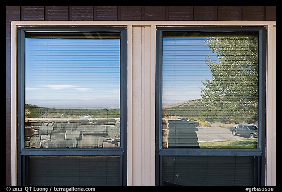Parking lot and Basin open view, Lehman Caves visitor Center window reflexion. Great Basin National Park (color)