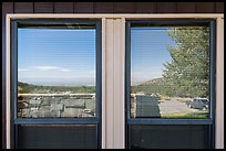 Parking lot and Basin open view, visitor center window reflexion. Great Basin National Park, Nevada, USA. (color)