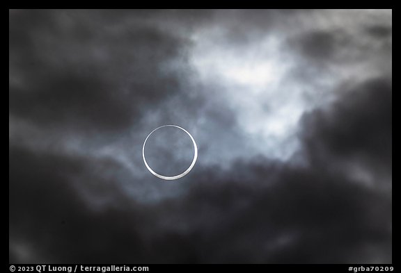 Sun and clouds, begining of annularity, eclipse of Oct 14, 2023. Great Basin National Park (color)