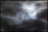 Sun and clouds, begining of annularity, eclipse of Oct 14, 2023. Great Basin National Park ( color)