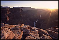 Cracked rocks and Colorado River at Toroweap, sunset. Grand Canyon National Park, Arizona, USA. (color)