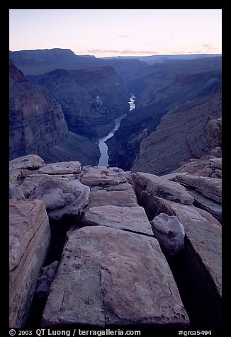 Cracks and Colorado River at Toroweap, dusk. Grand Canyon National Park, Arizona, USA.