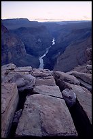 Cracks and Colorado River at Toroweap, dusk. Grand Canyon National Park, Arizona, USA.