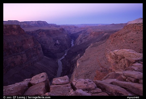 Cracked rocks and Colorado River at Toroweap, dawn. Grand Canyon National Park, Arizona, USA.