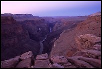 Cracked rocks and Colorado River at Toroweap, dawn. Grand Canyon National Park, Arizona, USA. (color)