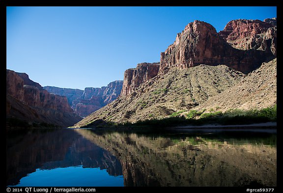Buttes and glassy reflections in Colorado River. Grand Canyon National Park (color)