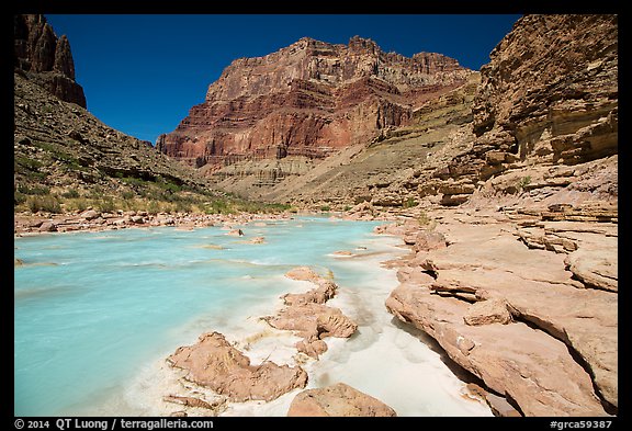 Little Colorodo River flows turquoise on its way to Colorado River below Chuar Butte. Grand Canyon National Park, Arizona, USA.