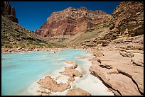 Little Colorodo River flows turquoise on its way to Colorado River below Chuar Butte. Grand Canyon National Park, Arizona, USA.