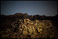 Ancient ruin and South Rim at night. Grand Canyon National Park, Arizona, USA.