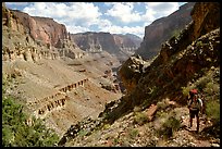 Backpacker on trail above Tapeats Creekr. Grand Canyon National Park, Arizona, USA. (color)