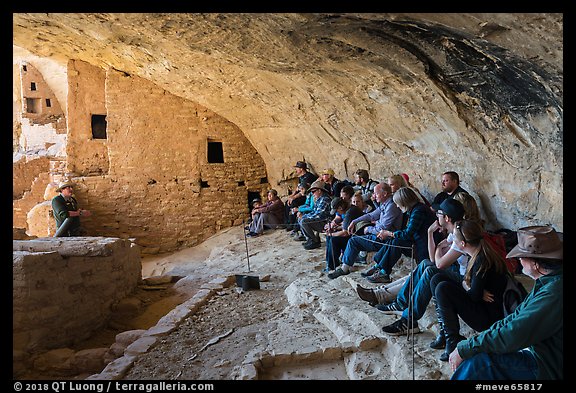 Ranger talks during guided tour of Long House. Mesa Verde National Park (color)