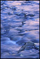 Water flowing over stones in Virgin River. Zion National Park, Utah, USA. (color)