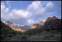 Wide view of Towers of the Virgin and clouds at sunrise. Zion National Park, Utah, USA.