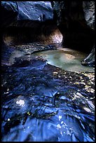 Water flowing in pools in the Subway, Left Fork of the North Creek. Zion National Park, Utah, USA. (color)